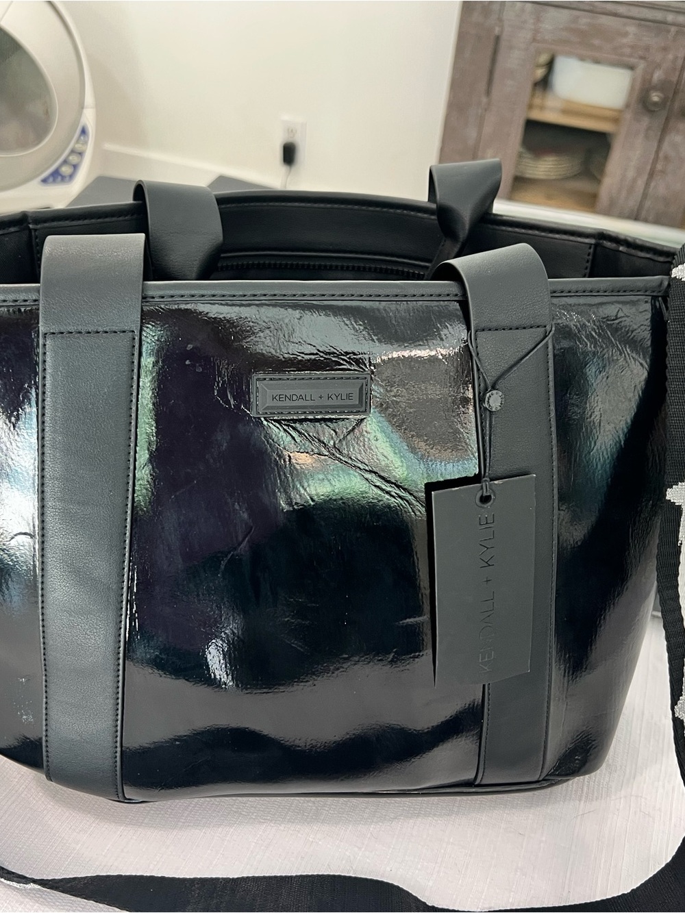 Kendall & Kylie Black Patent Duffel Bag with Straps